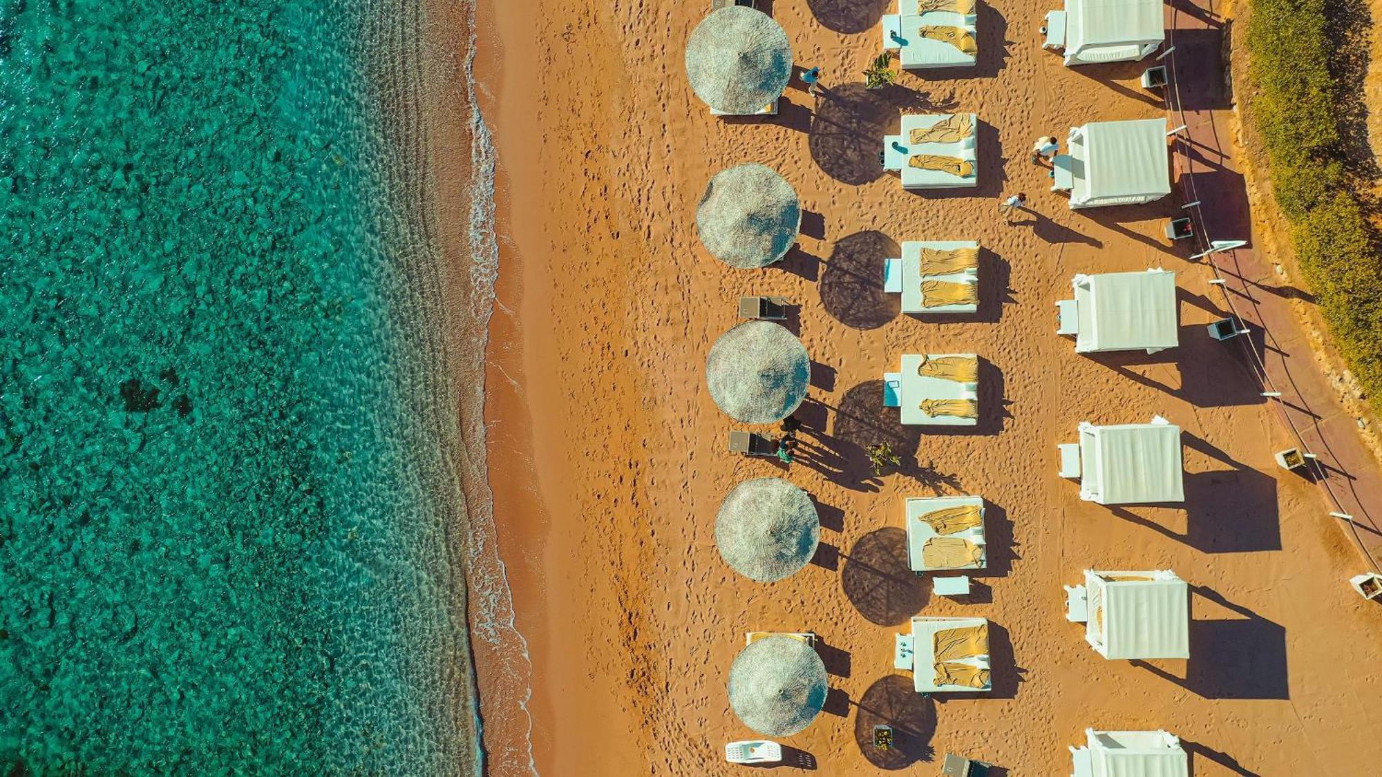 Domina Coral Bay Resort, Diving , Spa & Casino Sarm es-Sejk Kültér fotó Aerial view of the beach