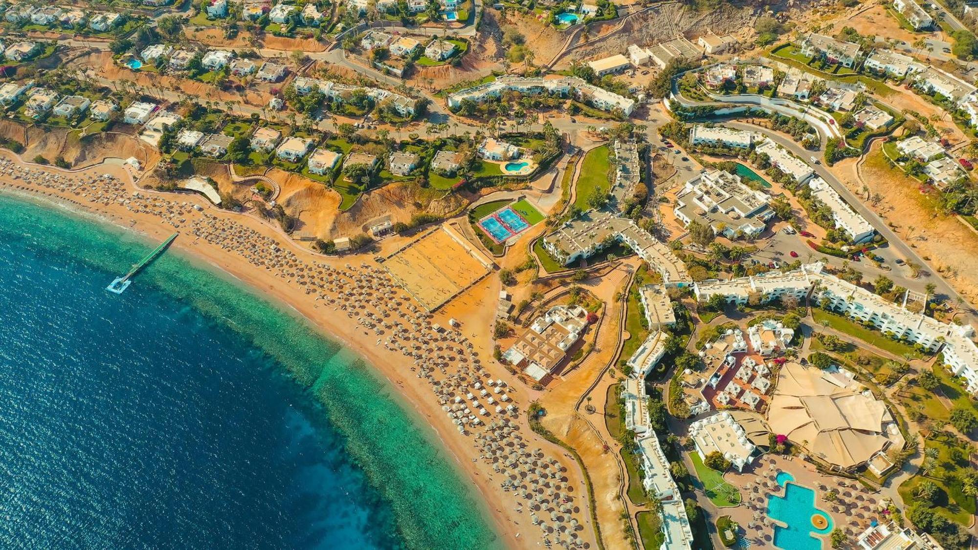 Domina Coral Bay Resort, Diving , Spa & Casino Sarm es-Sejk Kültér fotó Aerial view of the bay