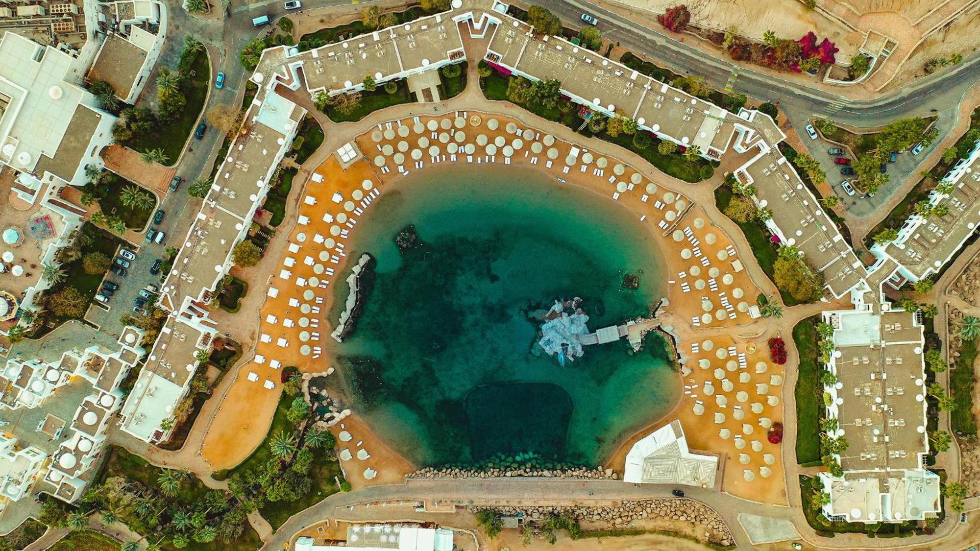 Domina Coral Bay Resort, Diving , Spa & Casino Sarm es-Sejk Kültér fotó Aerial view of the lagoon